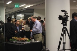 Camera is ready for live roundtable video at Pan's offices in downtown Boston.