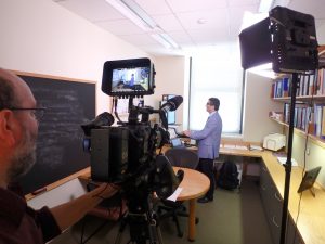 Filming in the scholars office 